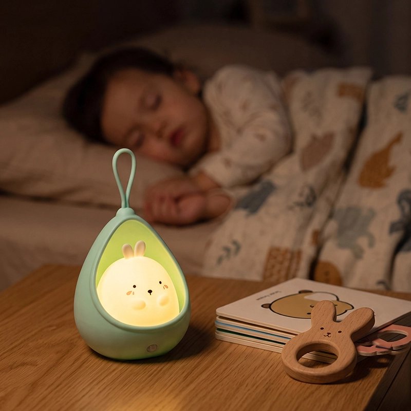 Bébé sous  Veilleuse bébé