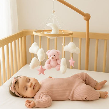 Mobile bebe ourson en peluche rose, nuages blancs moelleux, étoiles roses et lune blanche